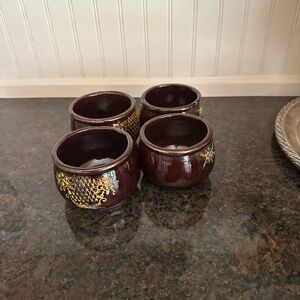 Set of Four Brown Decorative Bowls
